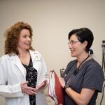 Medical staff converse at Paul's Run