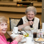 residents sharing a meal